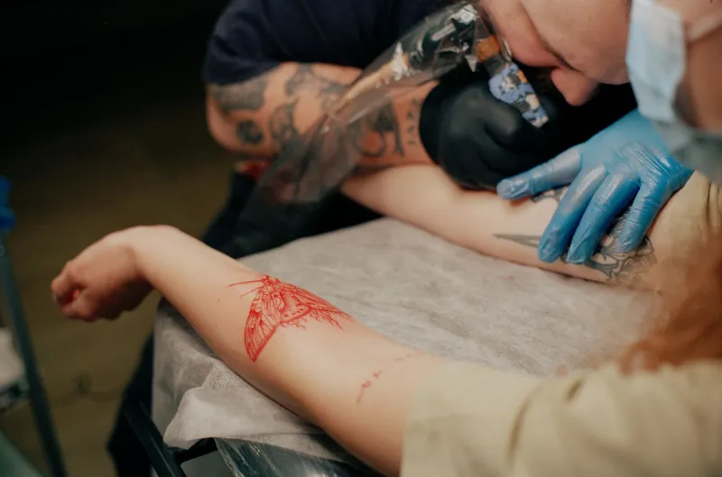 Inked in Red and Black: A Tattoo Artist's Tour of Flamurtari Iconography